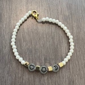 CELESTIAL" GLOW IN THE DARK BEADED BRACELET, ONE SIZE, GOLD/ WHITE COLORED BEADS